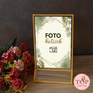 Napis Foto kotiček v elegantnem zlatem okvirju za dekoracijo na poroki ali rojstnem dnevu.